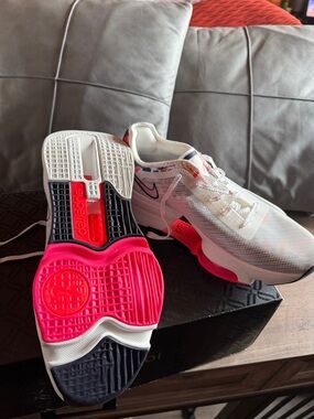Nike Women Sneakers in White with Bright Pink and Navy Accents